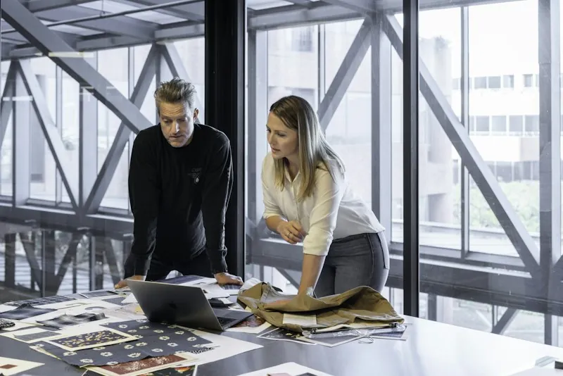 Two colleagues planning at a table